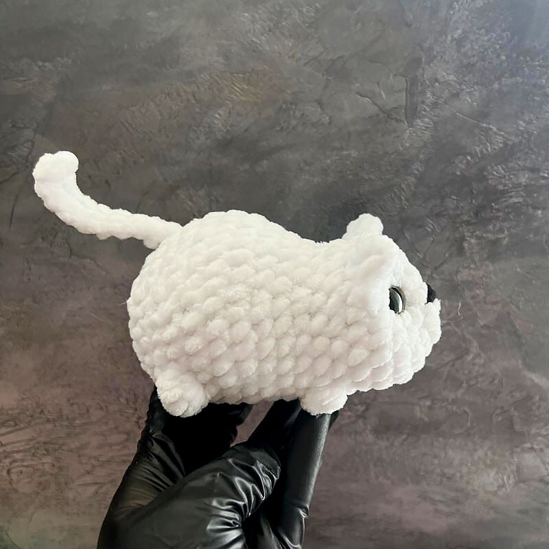 Fluffy mohair kitten amigurumi in progress with brushing technique